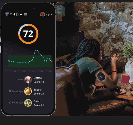 Woman wearing her continuous gluocose monitor and eating dinner